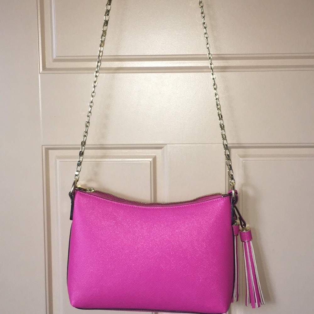 A pink shoulder purse